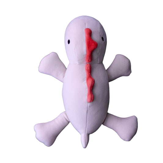 White plush toy with red accents on a black background
